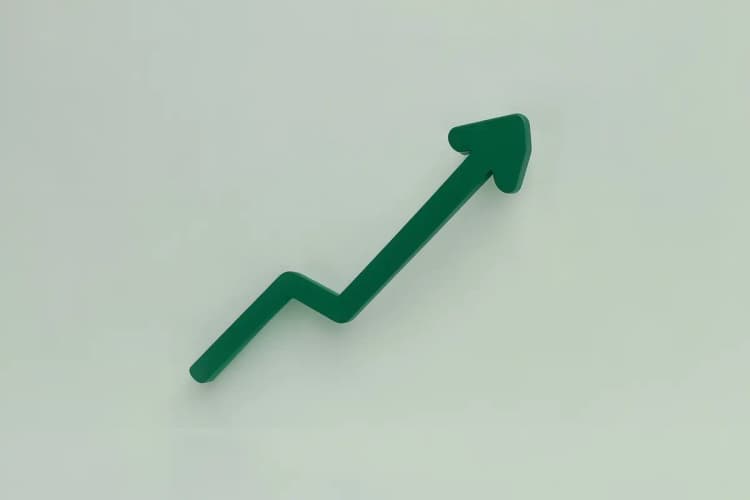 Gráfico de linha ascendente com o símbolo de porcentagem, representando tendências de mercado.